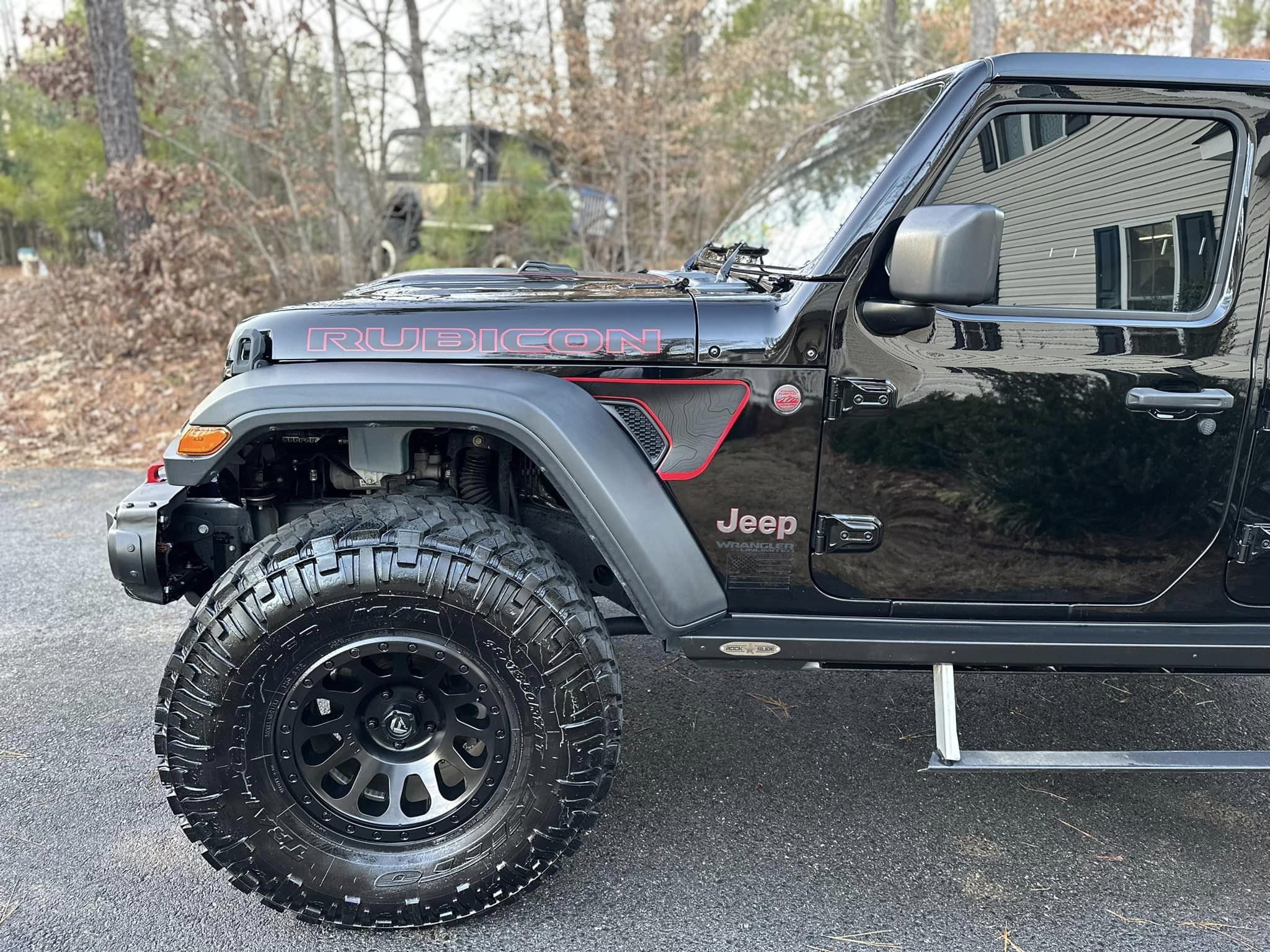 Front panel of a black Jeep Wrangler