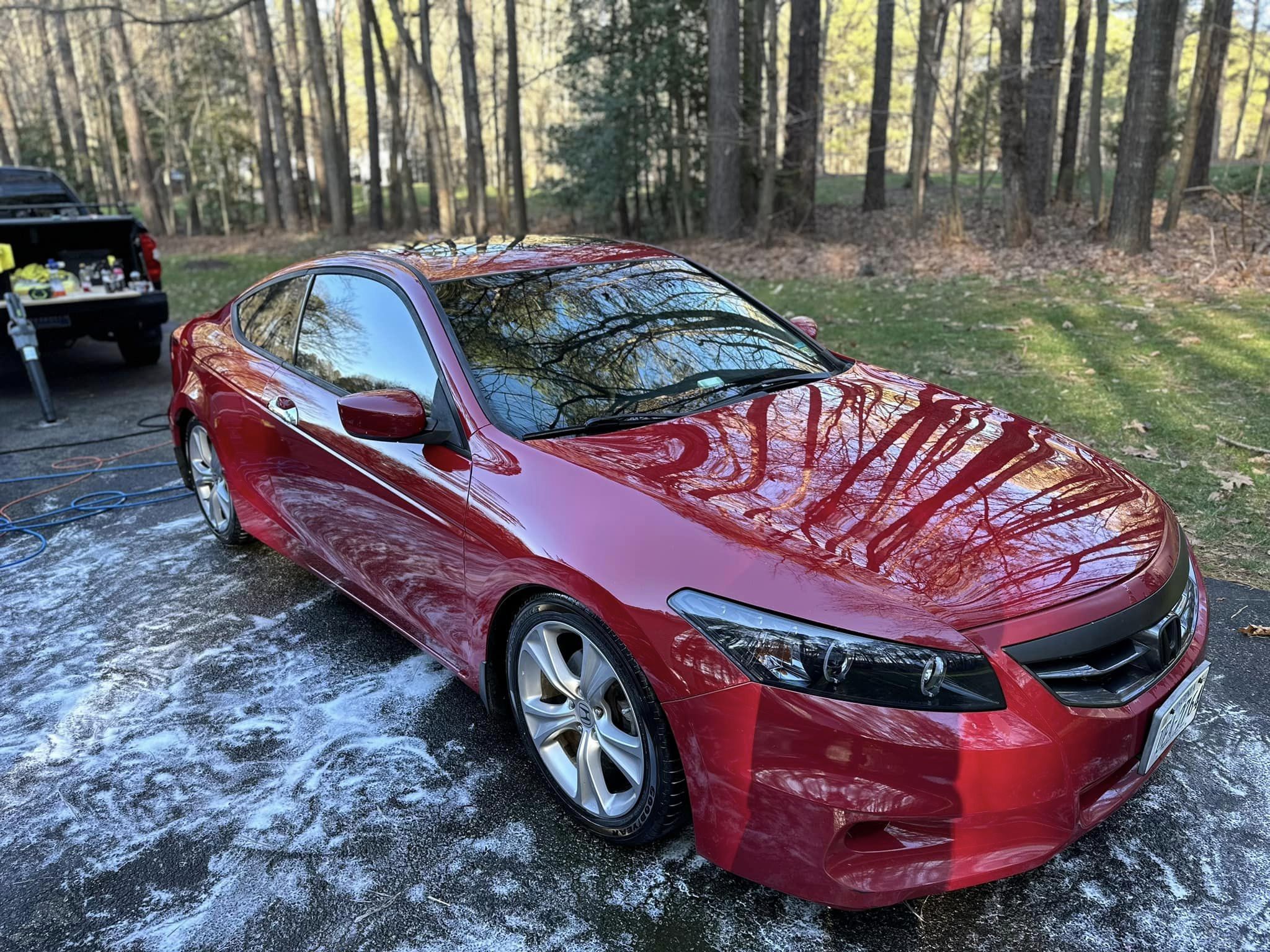 A gleaming red Honda Accord Coupe
