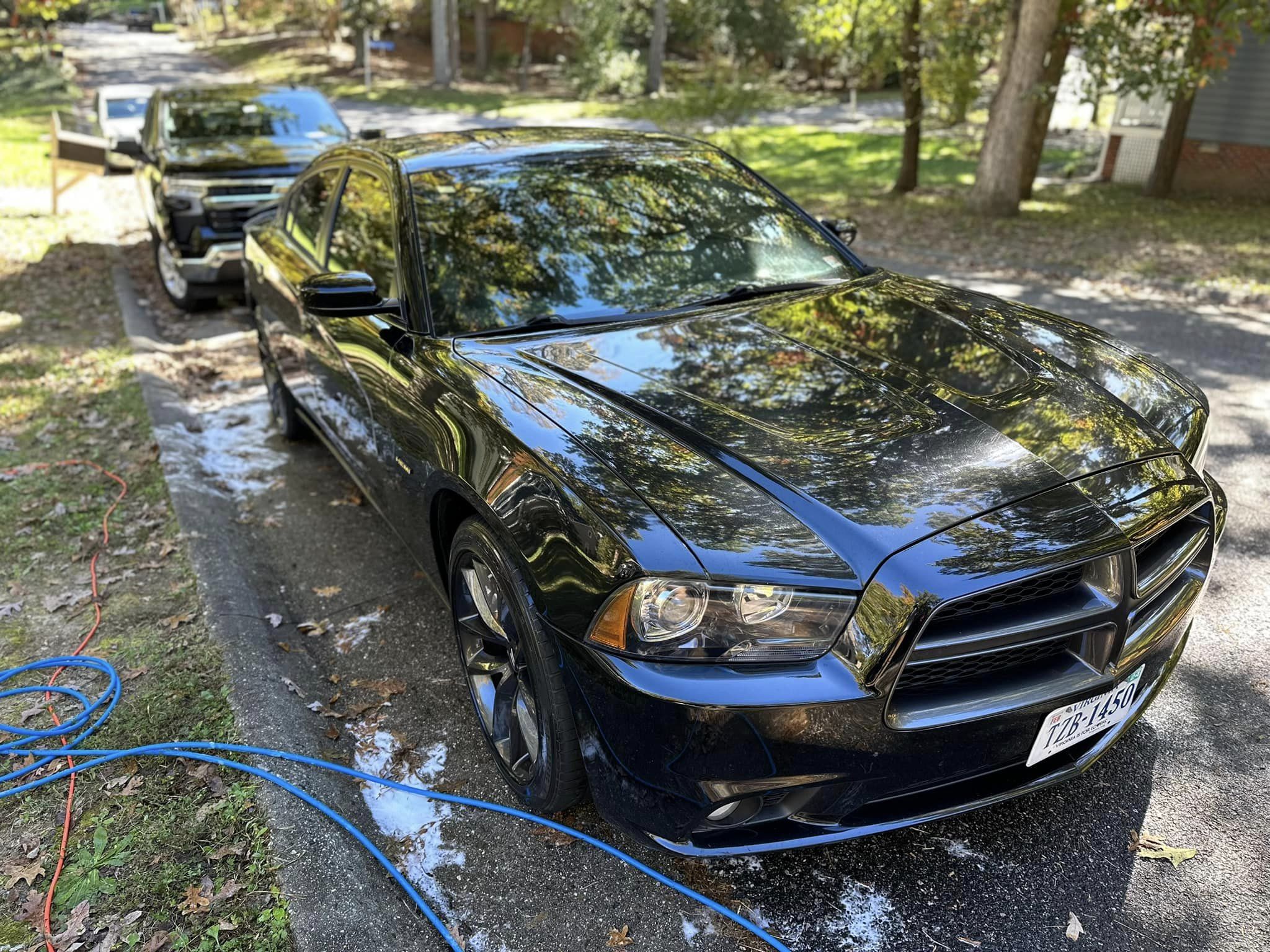 black car gleaming in the sunlight