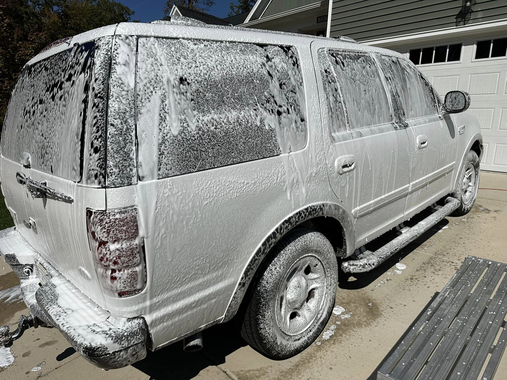 a giant SUV all soapy from the new foam cannon
