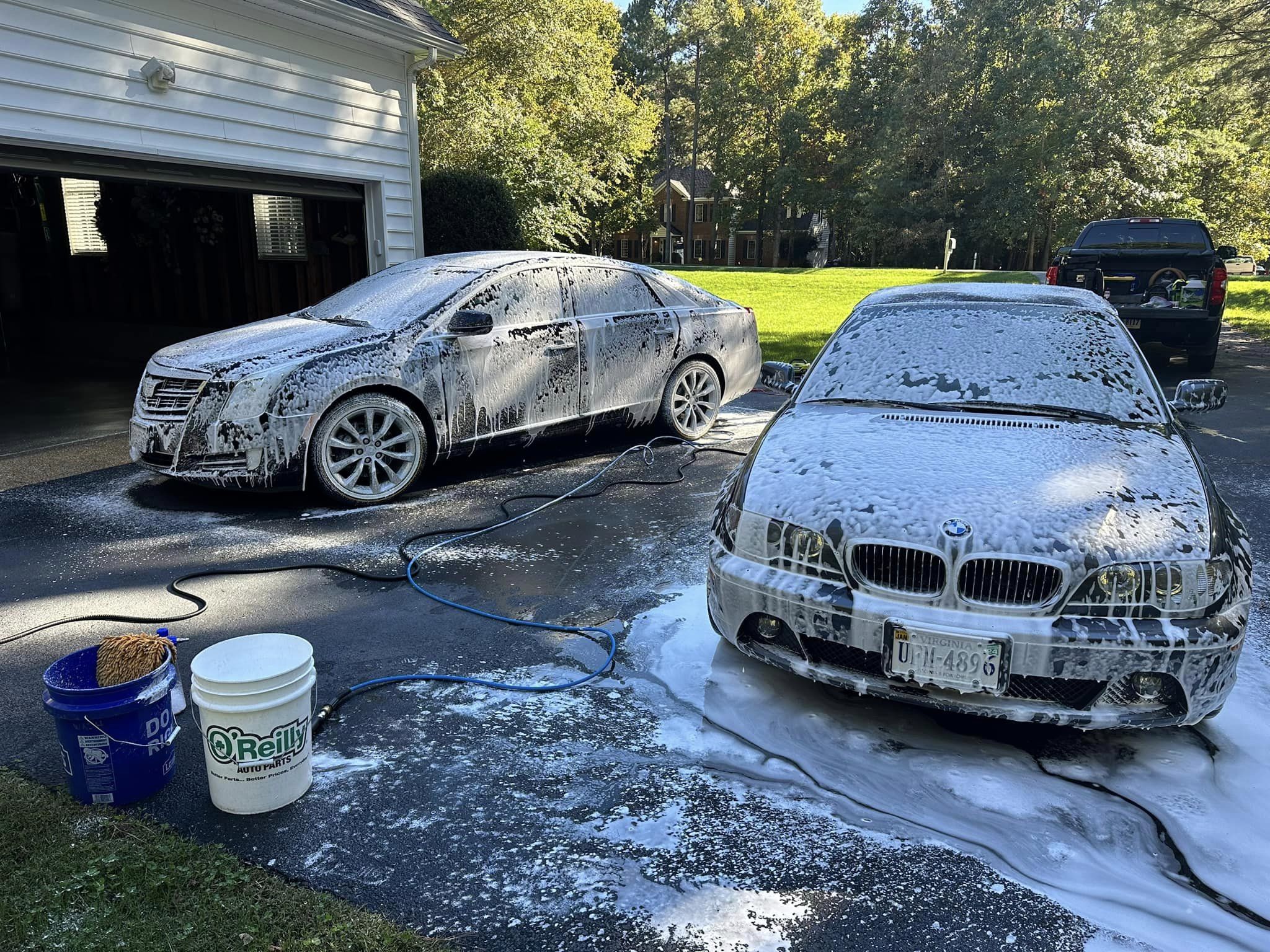 a black cadillac sedan gleaming in the light