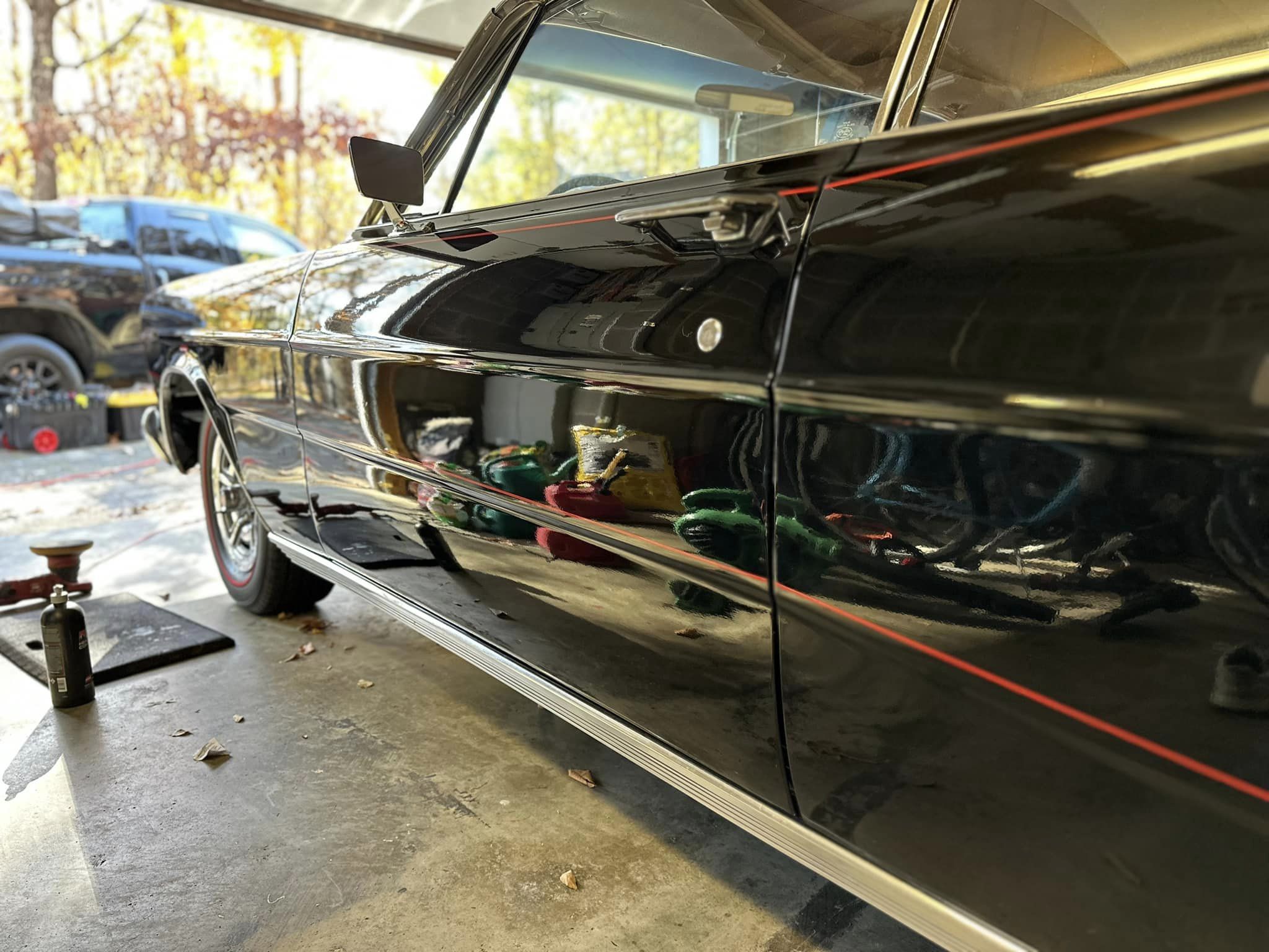 A black 66 Ford Galaxie, closeup of driver door
