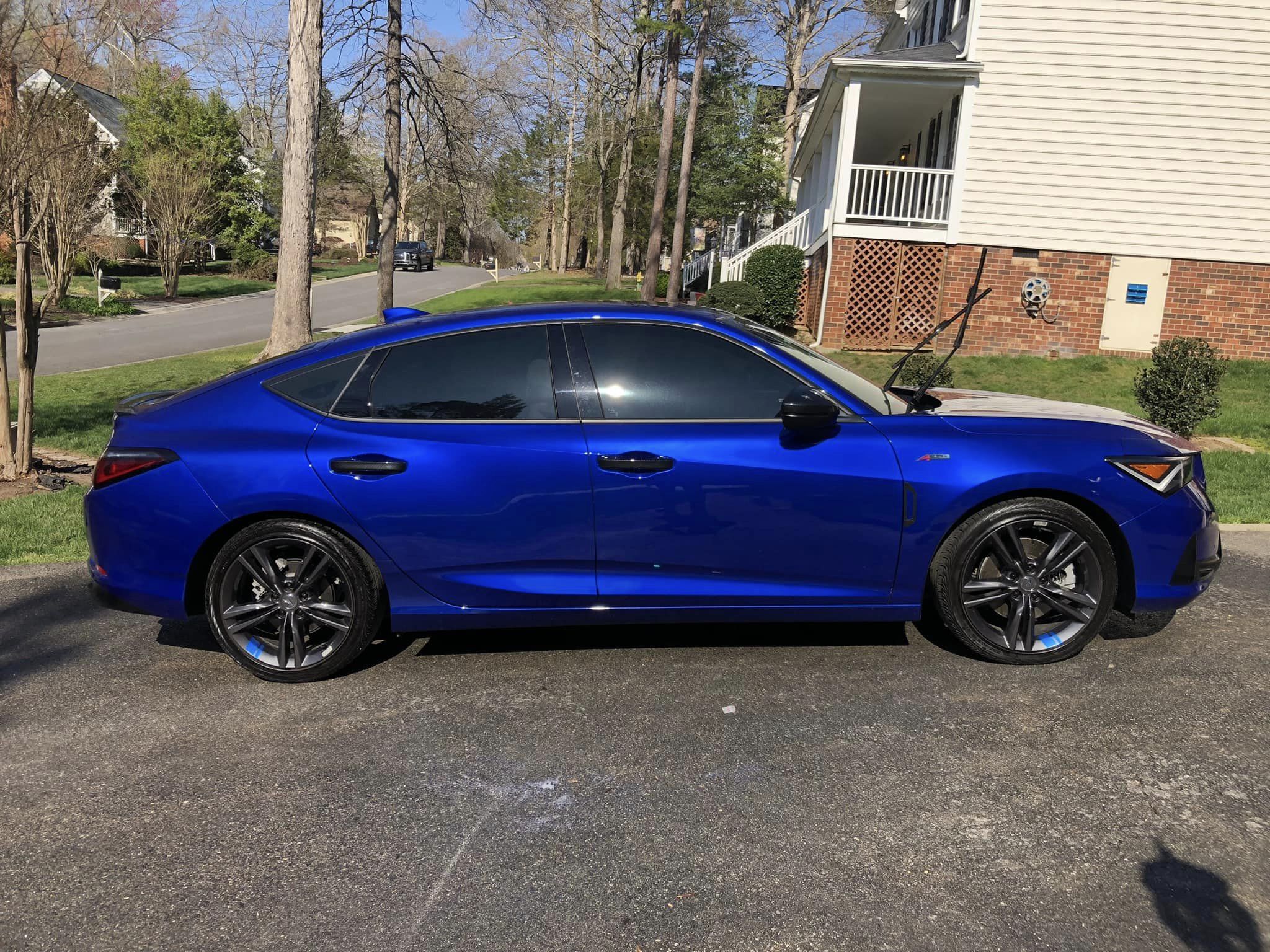 A blue car immaculately detailed