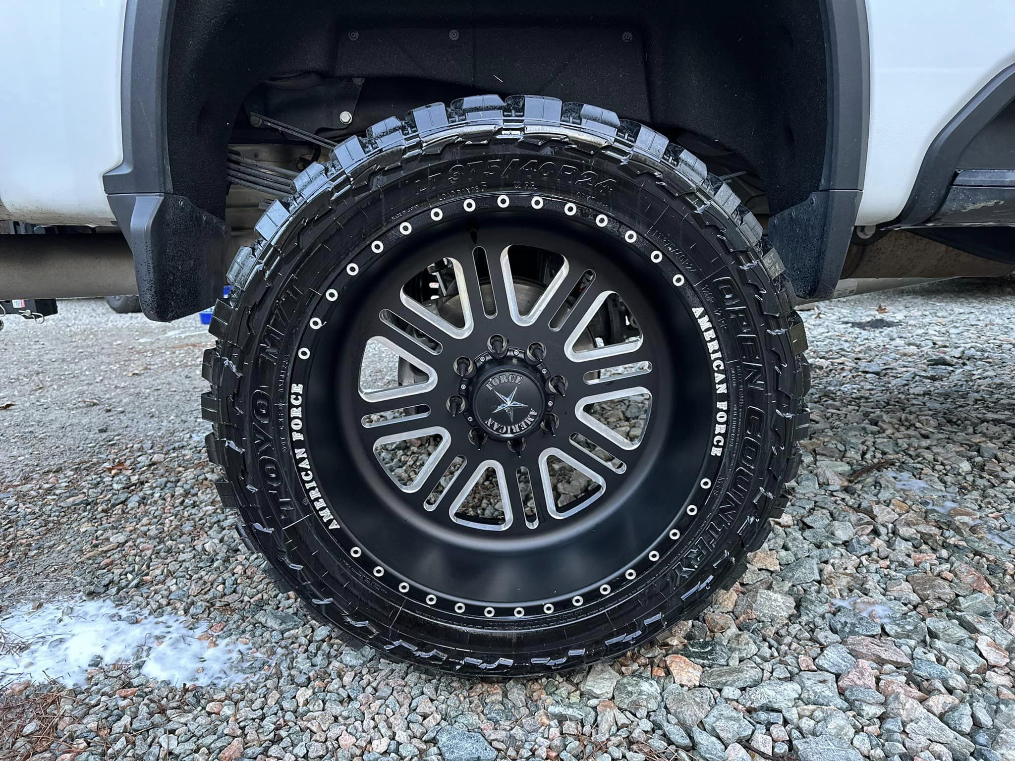 A detailed and polished black wheel and tire