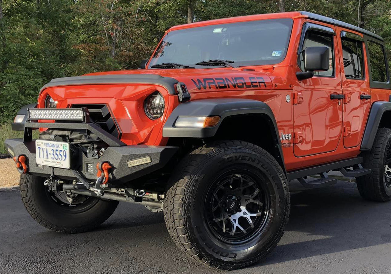 a gleaming red jeep